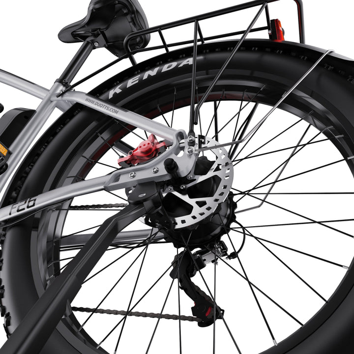 Close-up of a bicycle wheel with disc brake system on a white background