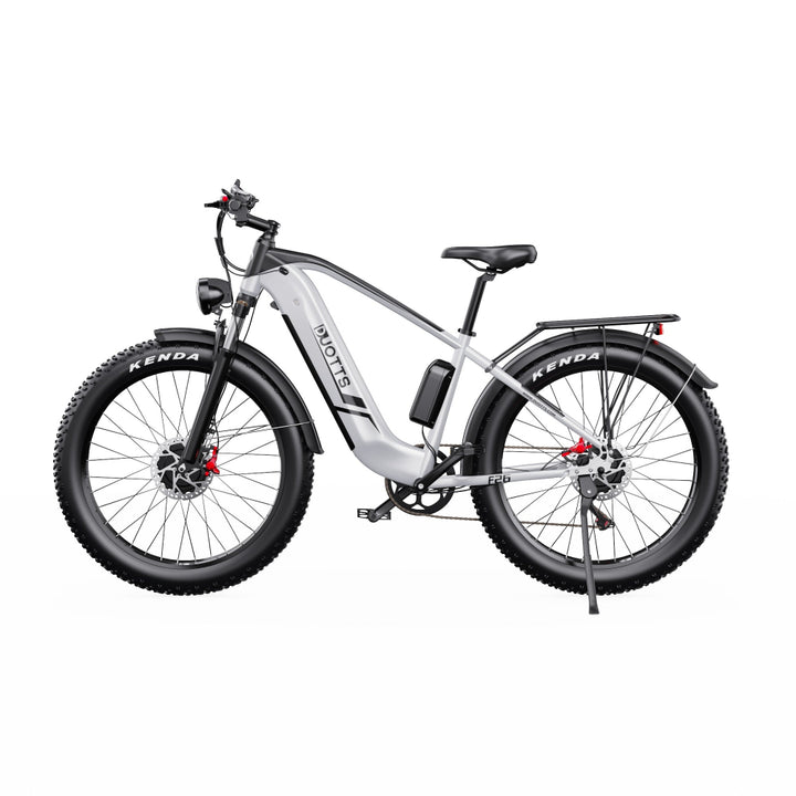 Electric bike with 'DUOTTS' branding on a white background