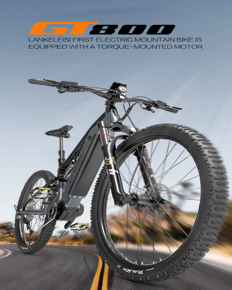 Electric mountain bike with torque-mounted motor on a blurred road background